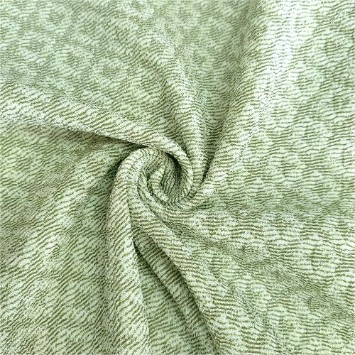 Neulottua Jacquard-patjan kangasta